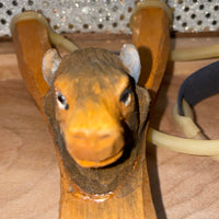 
              Wooden Animal Slingshot
            