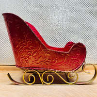 
              Red Scroll w/Gold Metal Sleigh
            