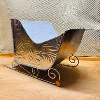 
              Silver Metal Scroll Sleigh
            