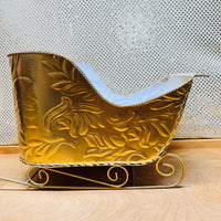 
              Gold Metal Scroll Sleigh
            