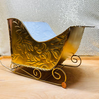 
              Gold Metal Scroll Sleigh
            