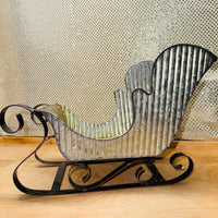 
              Rippled Metal Sleigh
            