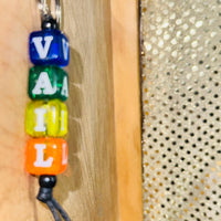 
              V-A-I-L Acryic Beads Keychain
            