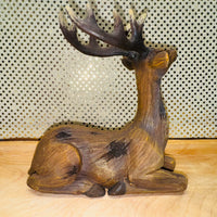 
              Sitting Deer Figurine
            