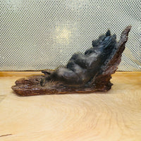 Bear Basking on Log Holding Fish Figurine