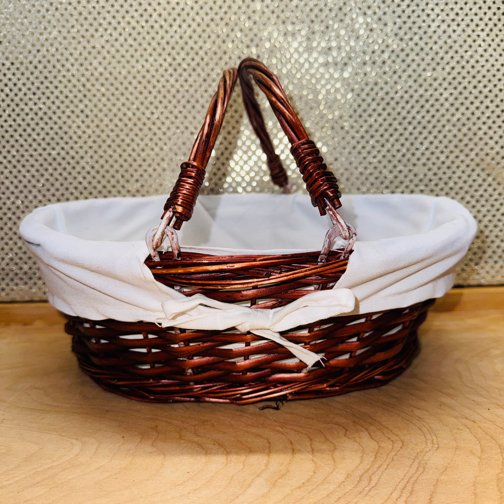 Stained Cotton-lined Oval Willow Basket