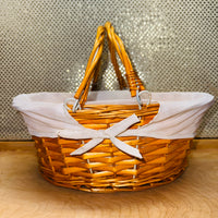 
              Stained Cotton-lined Oval Willow Basket
            