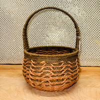 
              Round Olive Green and Tan Basket
            