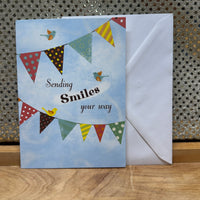 
              Sending Smiles Card
            