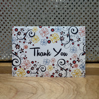 
              Cream with Orange-red, Blue and Yellow Flowers Card
            