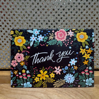 
              Black with Pink, Yellow and Blue Flowers
            