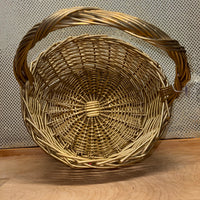 
              Gold Painted Round Handled Wicker Basket
            