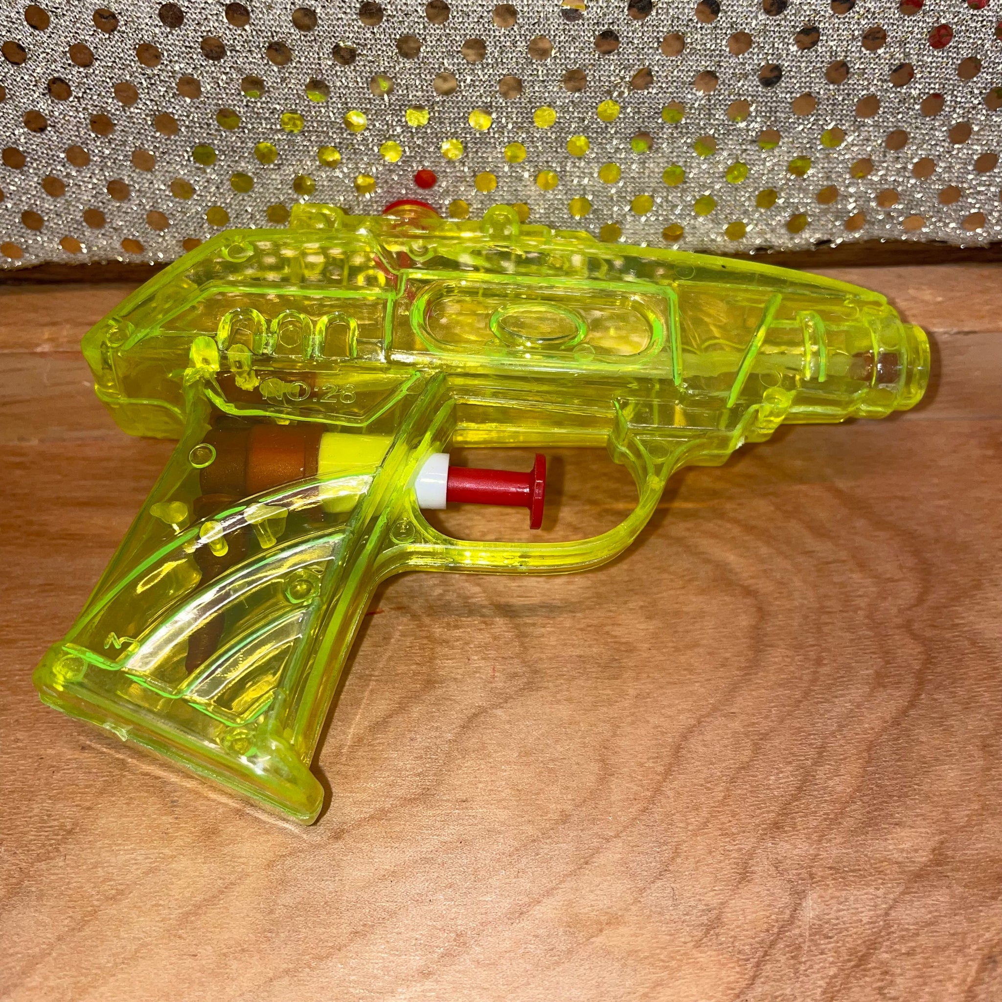 Green retailer squirt gun